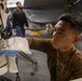 Strike Fighter Squadron 37 Sailor Conducts Maintenance