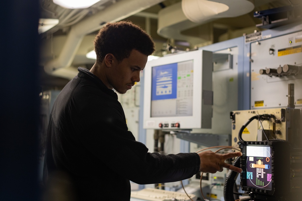 USS Gerald R. Ford (CVN 78) Sailor Conducts Maintenance