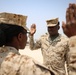 TF 51/5th MEB Marine reenlists on NSA Bahrain