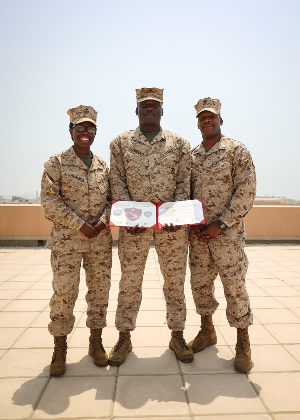 TF 51/5th MEB Marine reenlists on NSA Bahrain