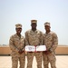 TF 51/5th MEB Marine reenlists on NSA Bahrain