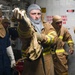 USS Pearl Harbor (LSD 52) Sailors simulate fire response during general quarters drill