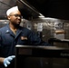 Curtis Wilbur Sailor Prepares Dinner