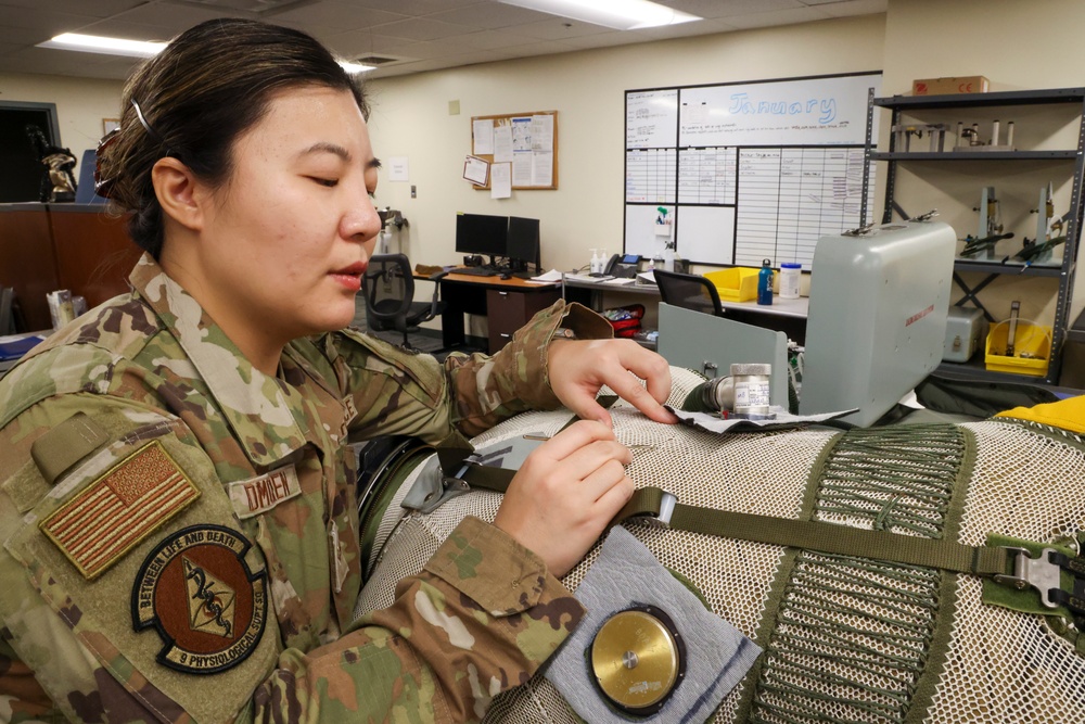 9th PSPTS repairs U-2 high altitude pressure suit