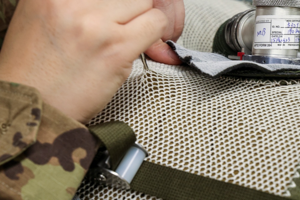 9th PSPTS repairs U-2 high altitude pressure suit