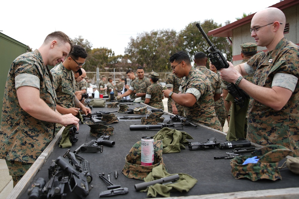 11th MEU Marines perform rifle maintenance