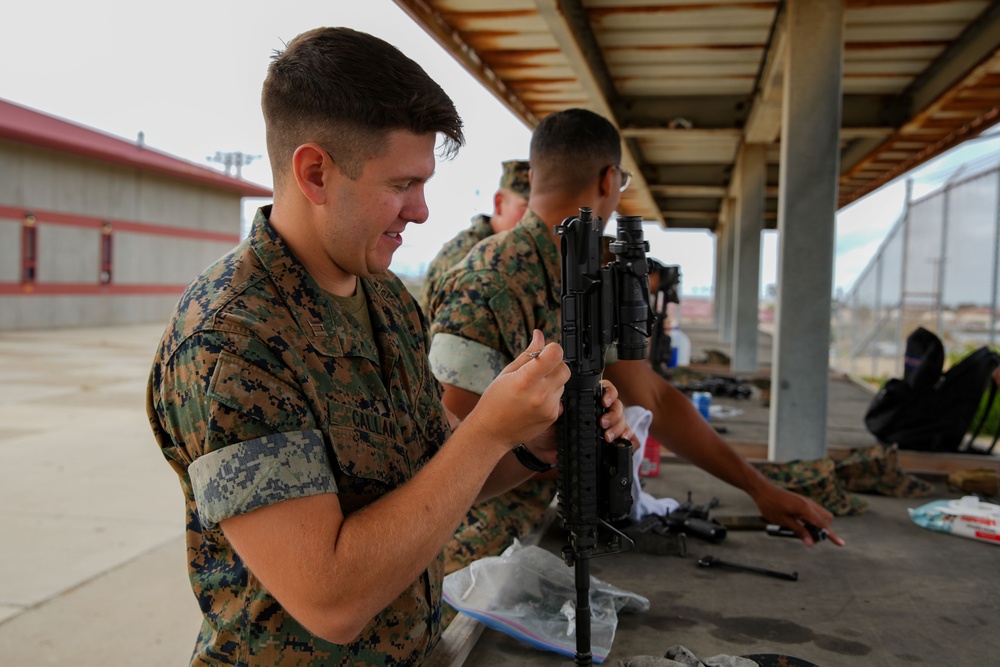11th MEU Marines perform rifle maintenance