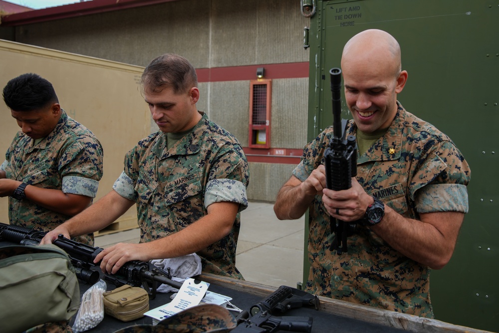 11th MEU Marines perform rifle maintenance