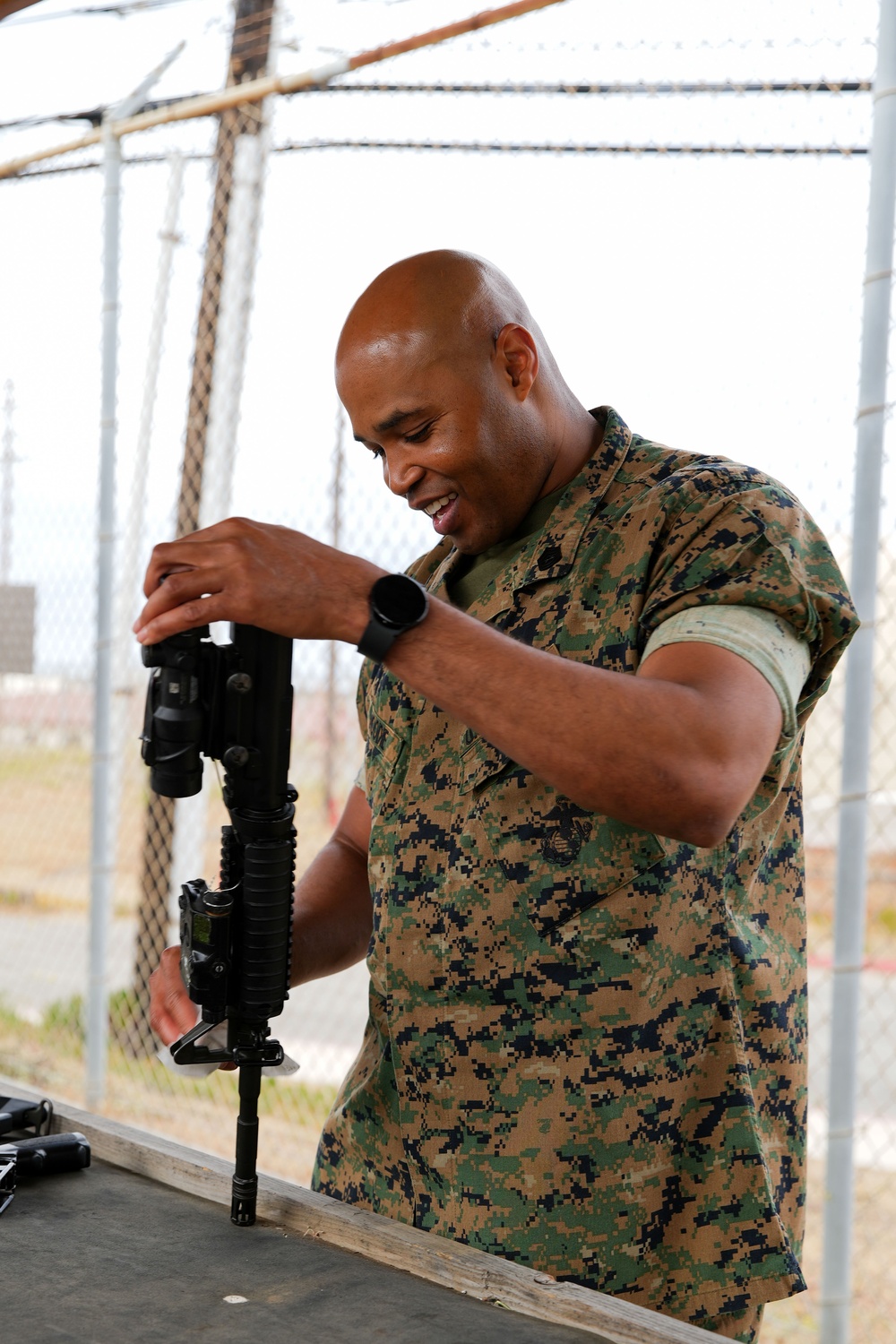 11th MEU Marines perform rifle maintenance