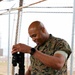 11th MEU Marines perform rifle maintenance