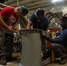 Contractors perform maintenance aboard USS Ronald Reagan