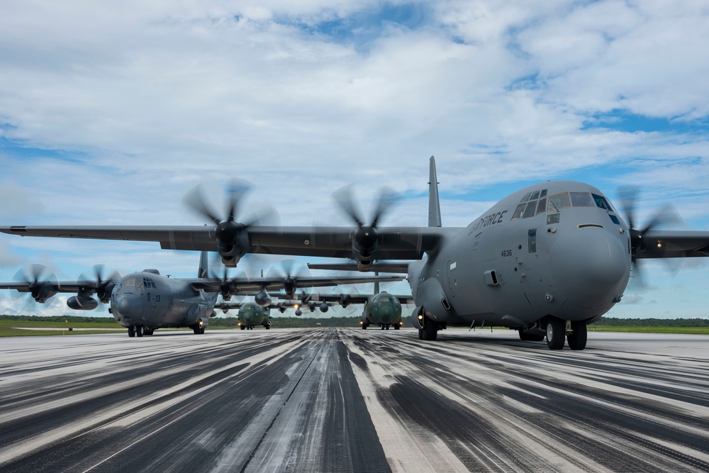 Partner nations fly together to celebrate the 81st Liberation Day Parade in Guam