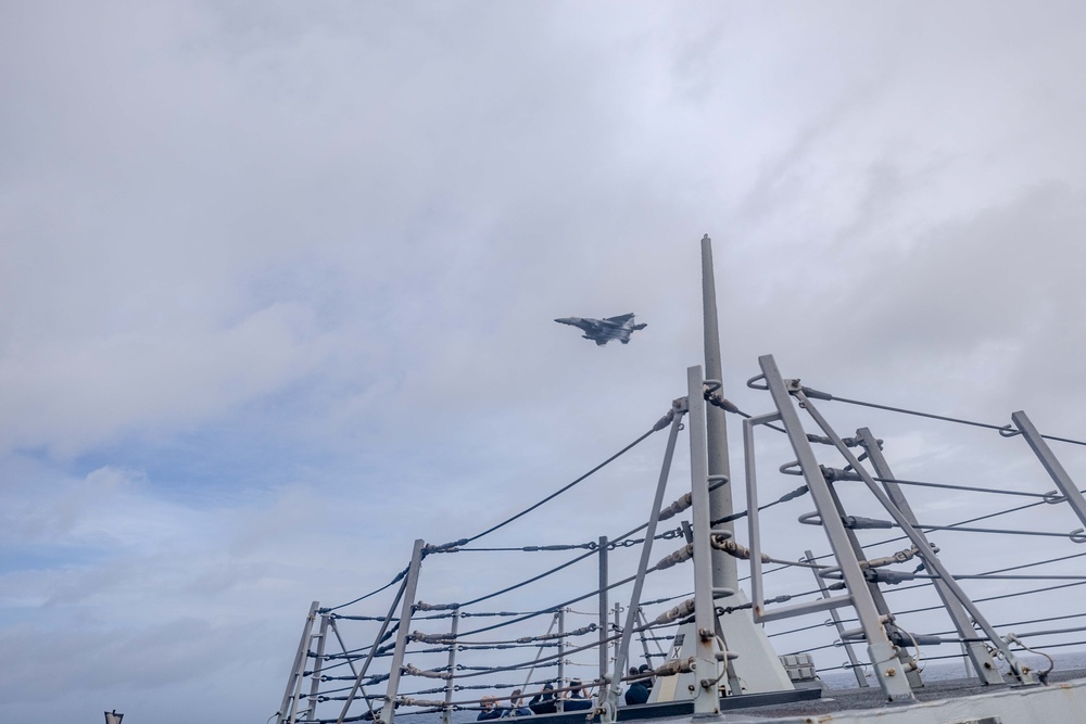 336th Fighter Squadron Conducts a Fly-by as USS Ralph Johnson (DDG 114) Departs Diego Garcia