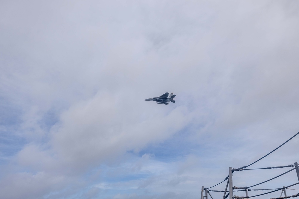 336th Fighter Squadron Conducts a Fly-by as USS Ralph Johnson (DDG 114) Departs Diego Garcia