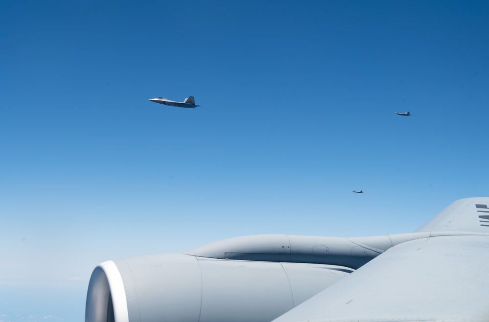 350th ARS refuels 90th FS F-22s during DLE 2025