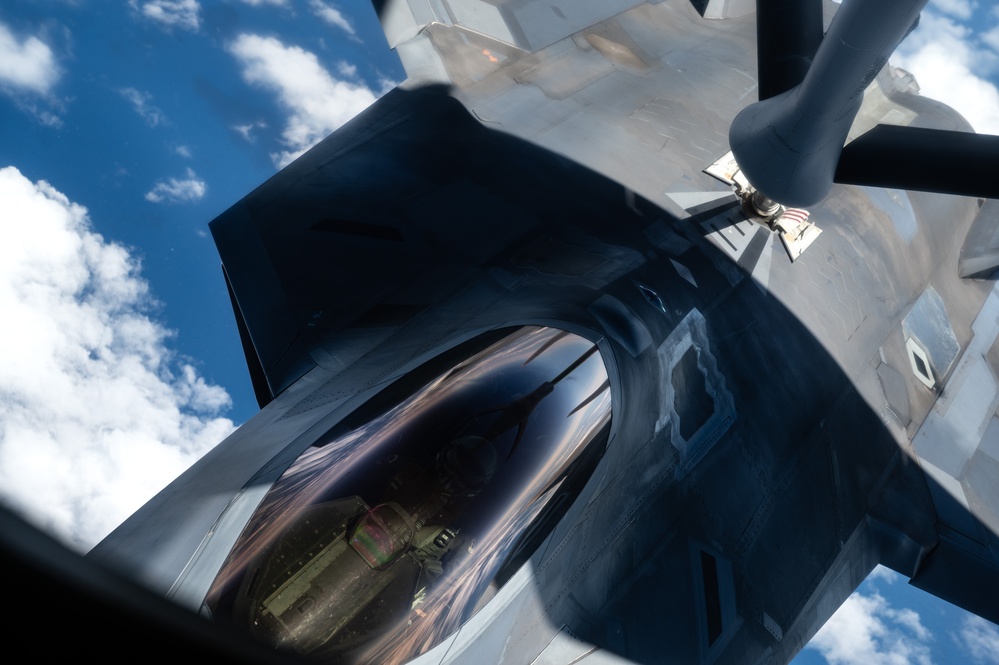 350th ARS refuels 90th FS F-22s during DLE 2025