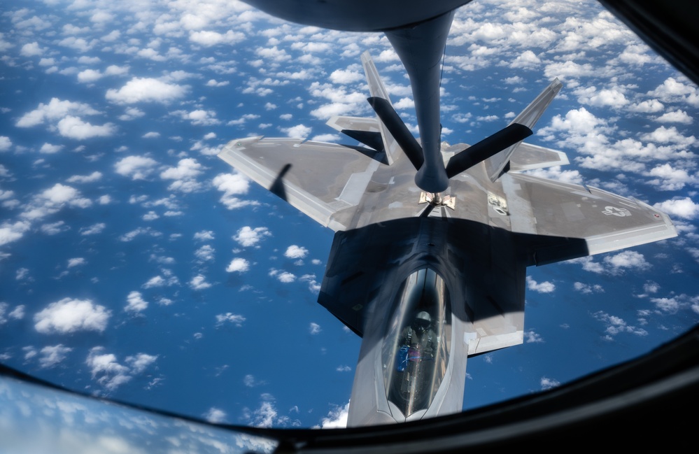 350th ARS refuels 90th FS F-22s during DLE 2025