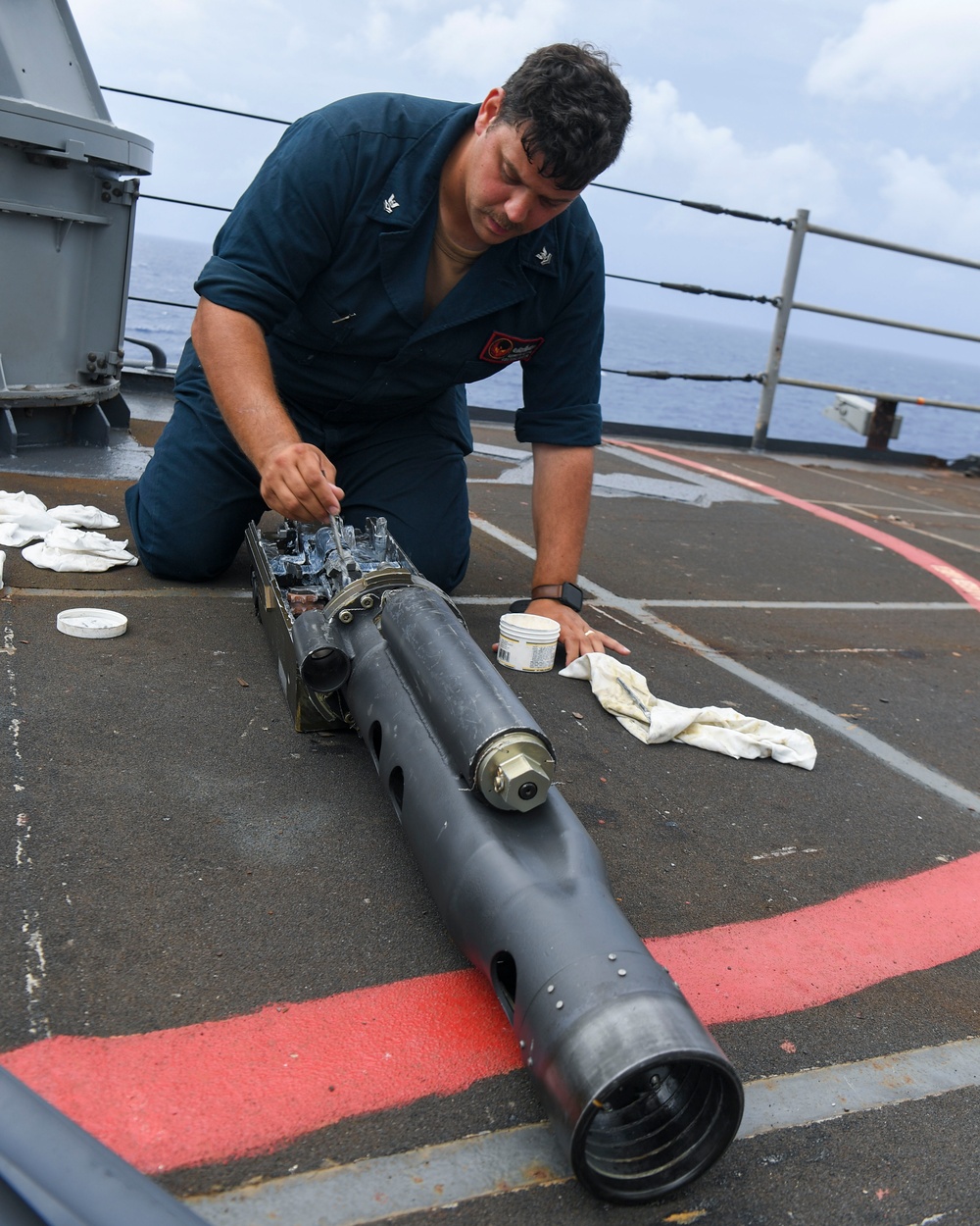 USS Pearl Harbor (LSD 52) Sailors Conduct Weapon Maintenance