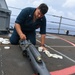 USS Pearl Harbor (LSD 52) Sailors Conduct Weapon Maintenance