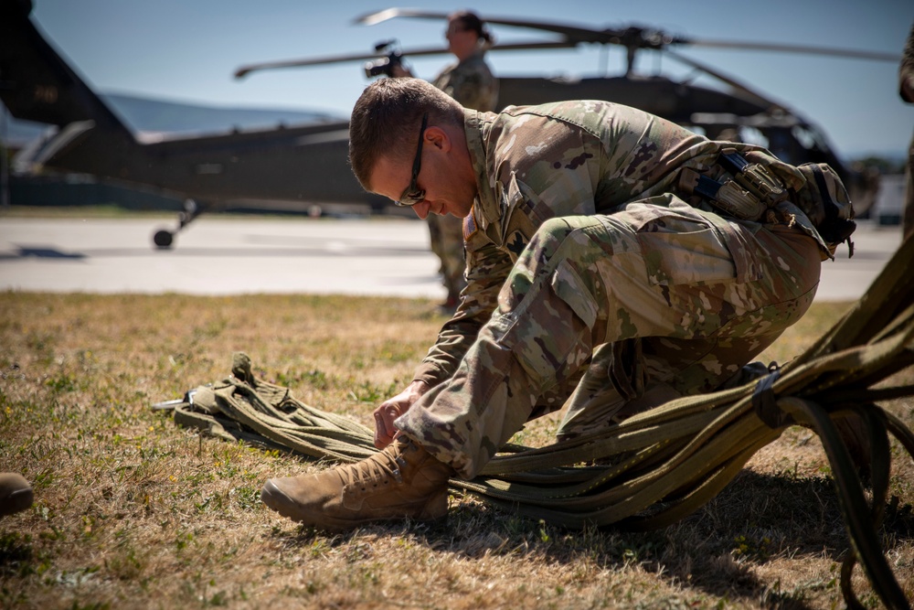 KFOR soldiers from Poland, Turkey and the U.S. Army conduct sling load training on Camp Novo Selo, Kosovo