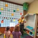 Tulsa District park ranger visits library to read Bobber the Water Safety dog book to children