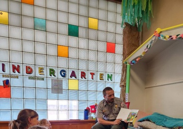 Tulsa District park ranger visits library to read Bobber the Water Safety dog book to children