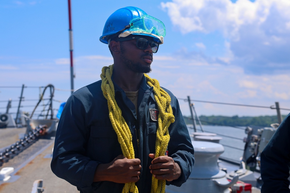 BMSN Dewan Henry gathers heaving lines during a sea-and-anchor detail