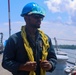 BMSN Dewan Henry gathers heaving lines during a sea-and-anchor detail