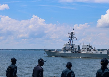 USS Bulkeley Sailors man the rails while passing the USS Thomas Hudner (DDG 116)