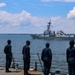 USS Bulkeley Sailors man the rails while passing the USS Thomas Hudner (DDG 116)