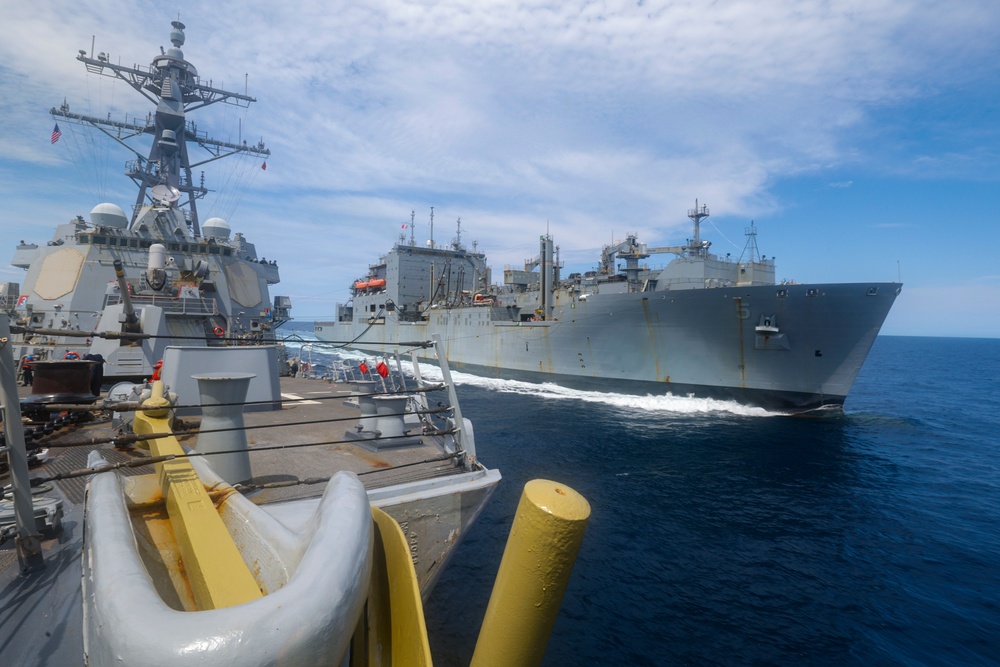 USS Bulkeley transits alongside USNS Robert E. Peary (T-AKE-5), during a replenishment-at-sea.