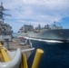 USS Bulkeley transits alongside USNS Robert E. Peary (T-AKE-5), during a replenishment-at-sea.