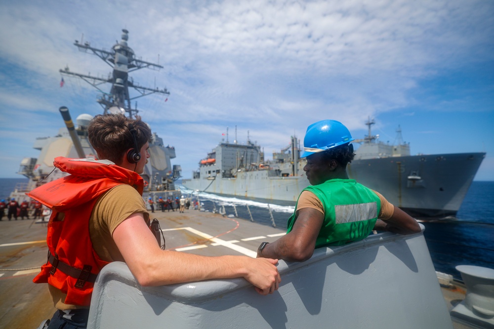 STG2 Gabriel Todd and SN Samuel Ofori passes word to the bridge via the forecastle phone talker station