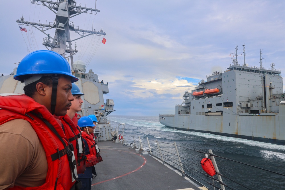 CTR2 Anthony Adams and STG2 Gabriel Todd man the rails on the forecastle