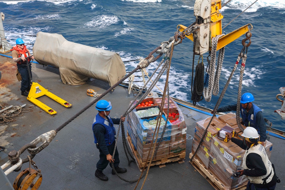 USS Bulkeley Sailors unload dry cargo on midship station six
