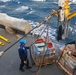 USS Bulkeley Sailors unload dry cargo on midship station six