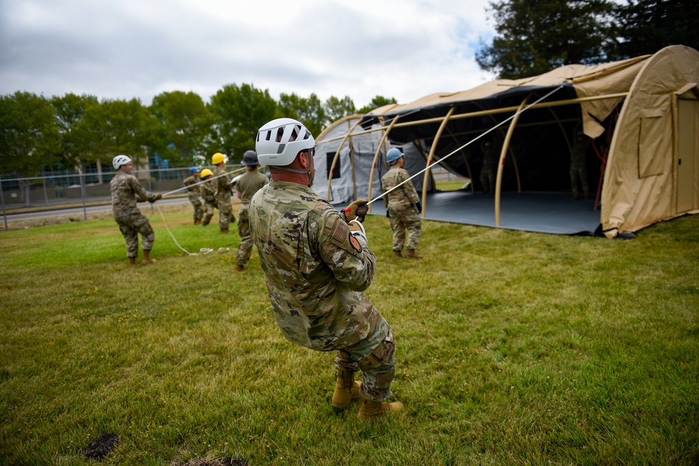 Airmen Train for Rapid Shelter Deployment in Field Exercise