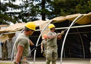 Airmen Train for Rapid Shelter Deployment in Field Exercise