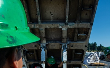 Headline: Ronald Reagan Sailors and Contractors Conduct Maintenance