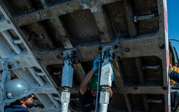 Headline: Ronald Reagan Sailors and Contractors Conduct Maintenance