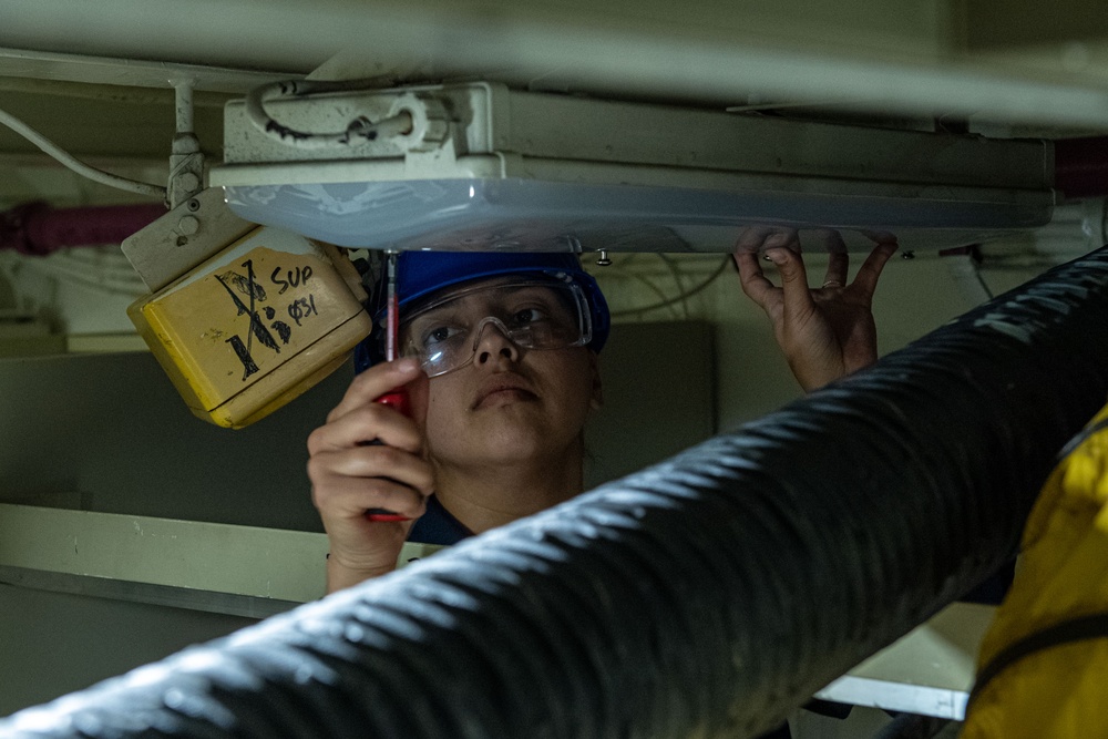 Headline: Ronald Reagan Sailors and Contractors Conduct Maintenance