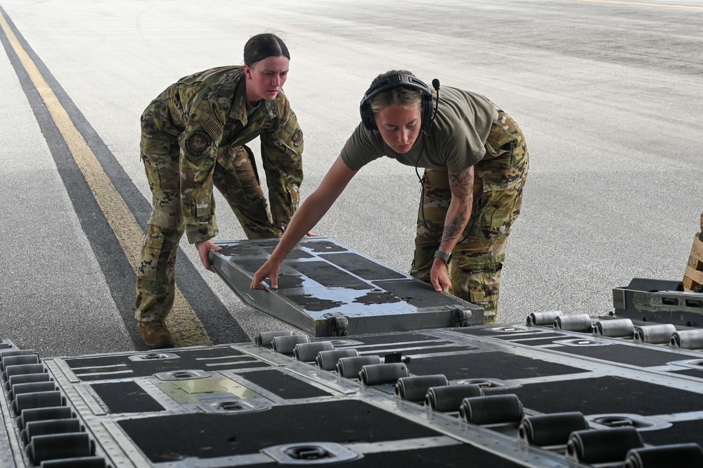 Airmen transport, offload cargo in support of DLE series operations in Tinian