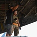 Airmen in Action: 735 AMS Airmen perform routine aircraft loading operations