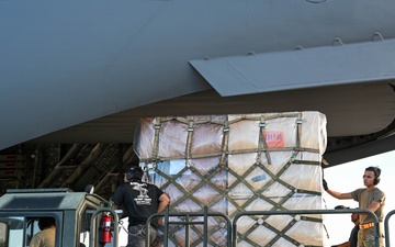 Airmen in Action: 735 AMS Airmen perform routine aircraft loading operations