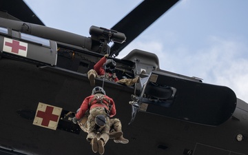 Alaska Army National Guard Black Hawk aviators host mission partners for multi-agency hoist symposium
