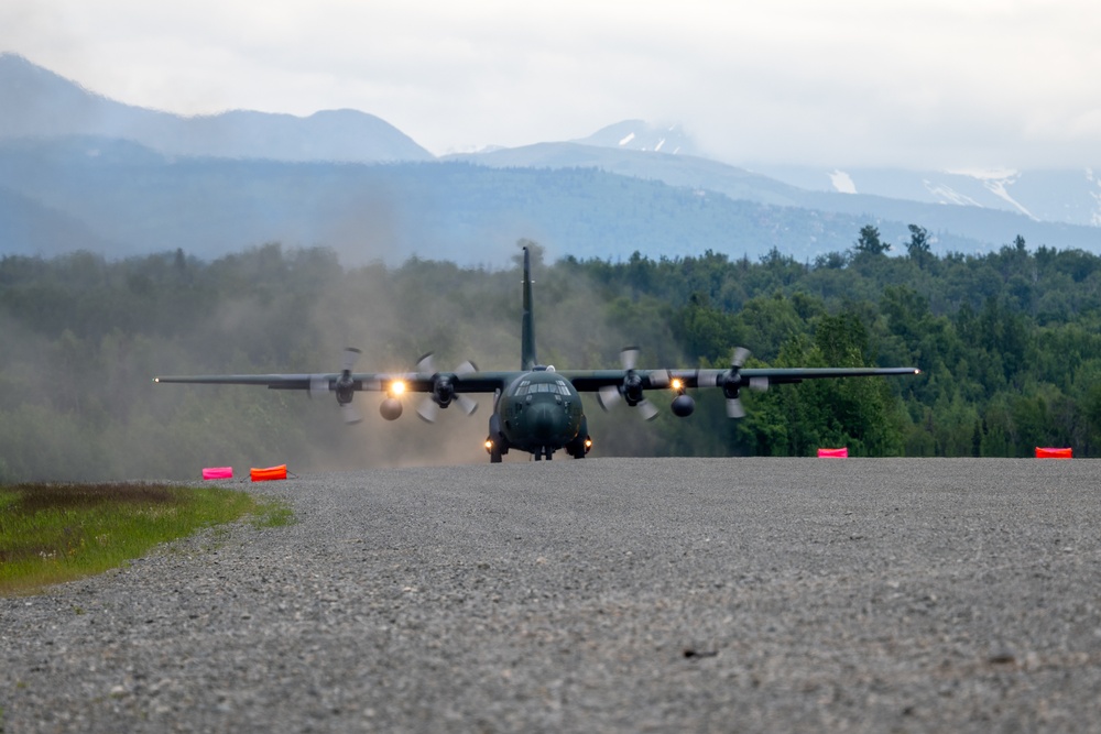 JASDF, USAF aircraft launch from  Malemute Drop Zone