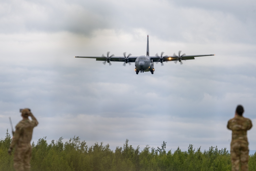 JASDF, USAF aircraft launch from  Malemute Drop Zone