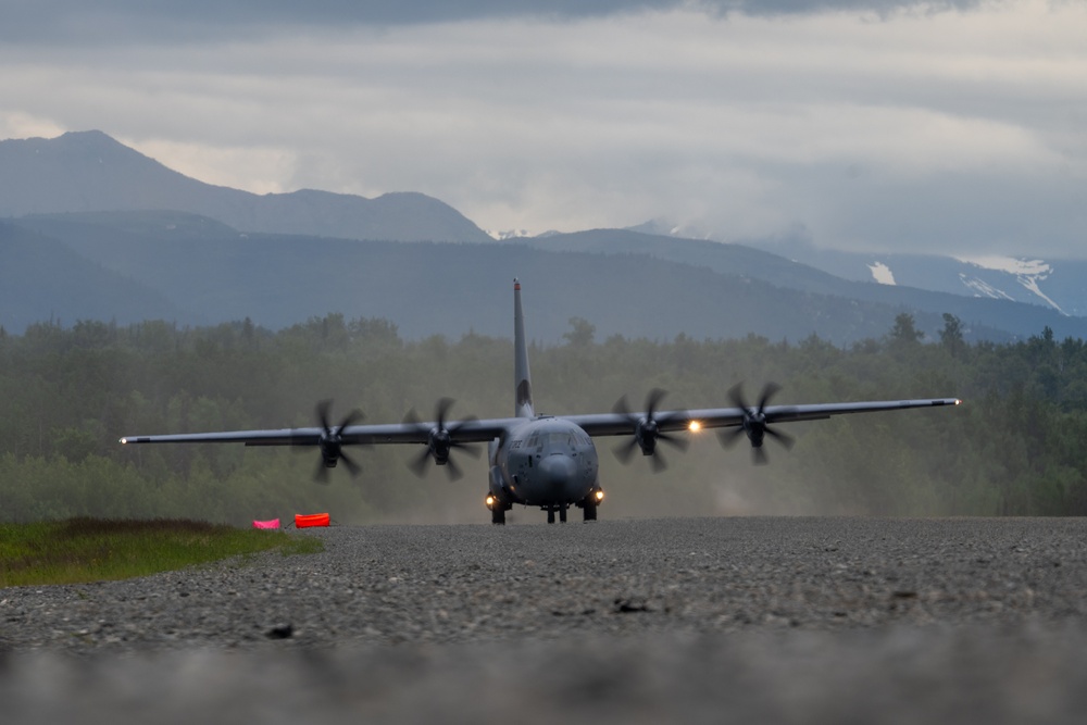 JASDF, USAF aircraft launch from  Malemute Drop Zone
