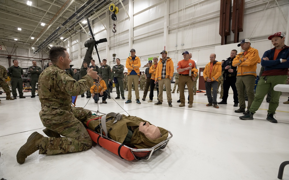 Alaska Army National Guard Black Hawk aviators host mission partners for multi-agency hoist symposium