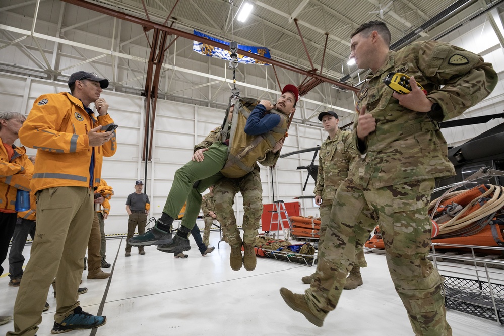 Alaska Army National Guard Black Hawk aviators host mission partners for multi-agency hoist symposium